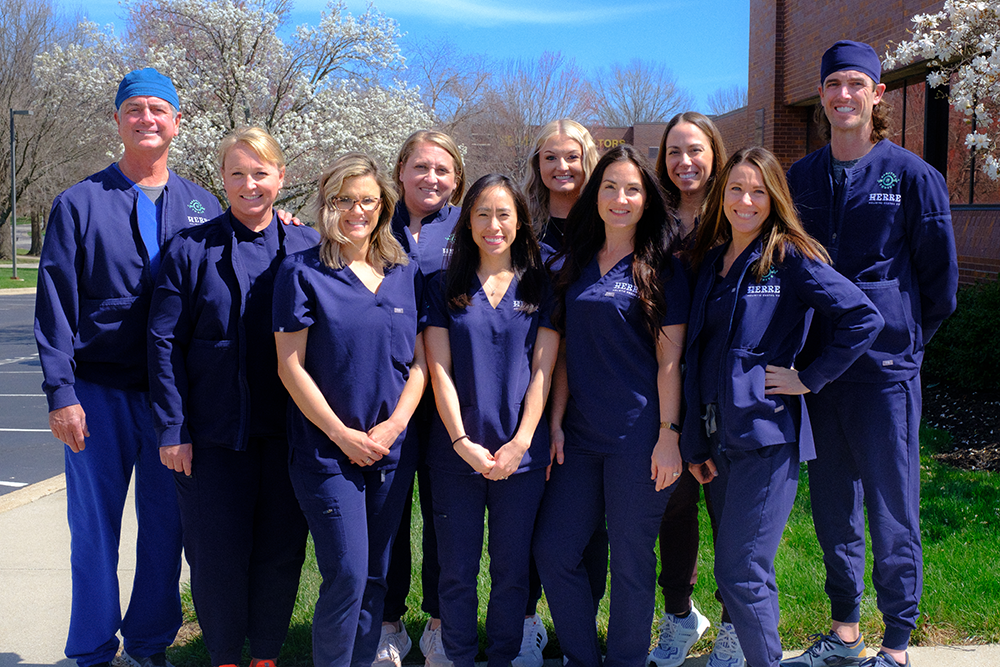 A group photo of the Herre Holistic Dental KC team